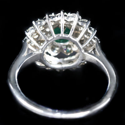 Estate Platinum 0.71 Carat Emerald and Diamond Ring