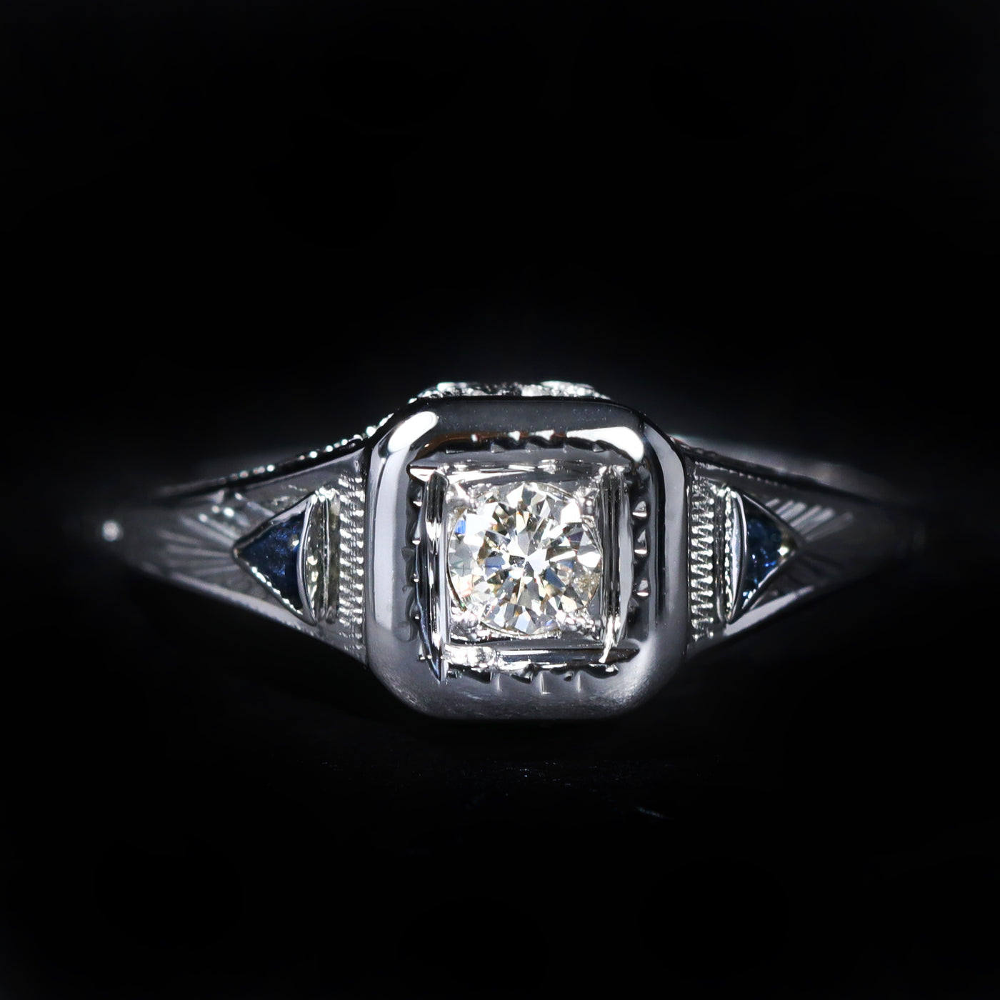 Art Deco 0.13 Carat Old European Cut Diamond and Sapphire Ring