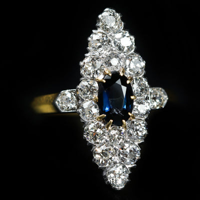 Edwardian Platinum Topped 18k Yellow Gold 0.68 Carat Sapphire and Diamond Navette Ring