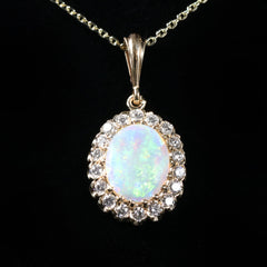 14k Yellow Gold 1.19 Carat Opal and Diamond Pendant - Walton's Jewelry