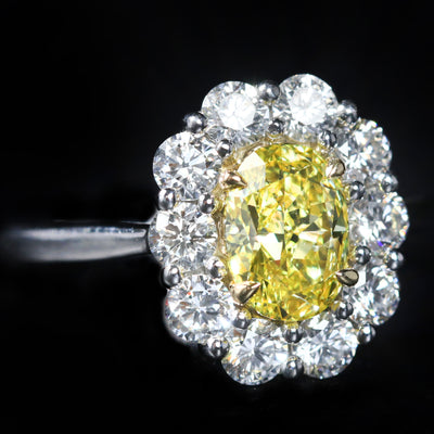 Platinum GIA 0.93 Carat Fancy Vivid Yellow Diamond Ring