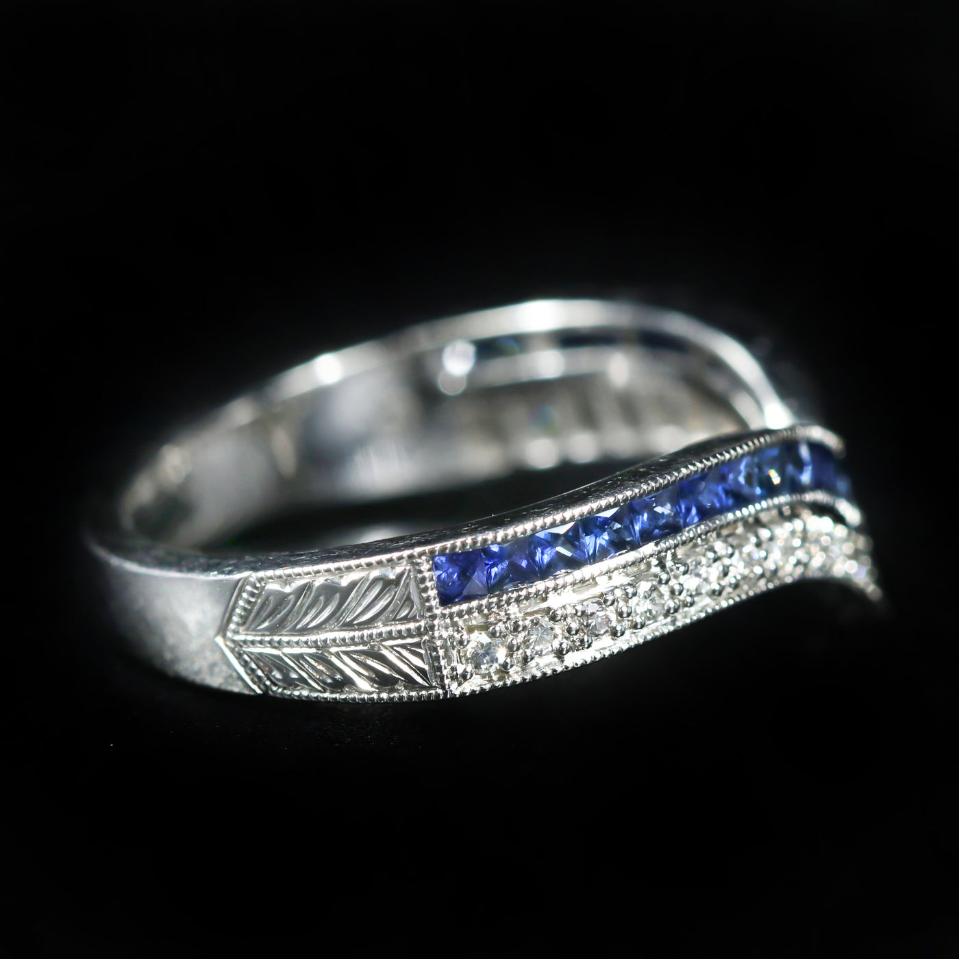Platinum 0.16 Carat Diamond and French Cut Blue Sapphire Curve Band