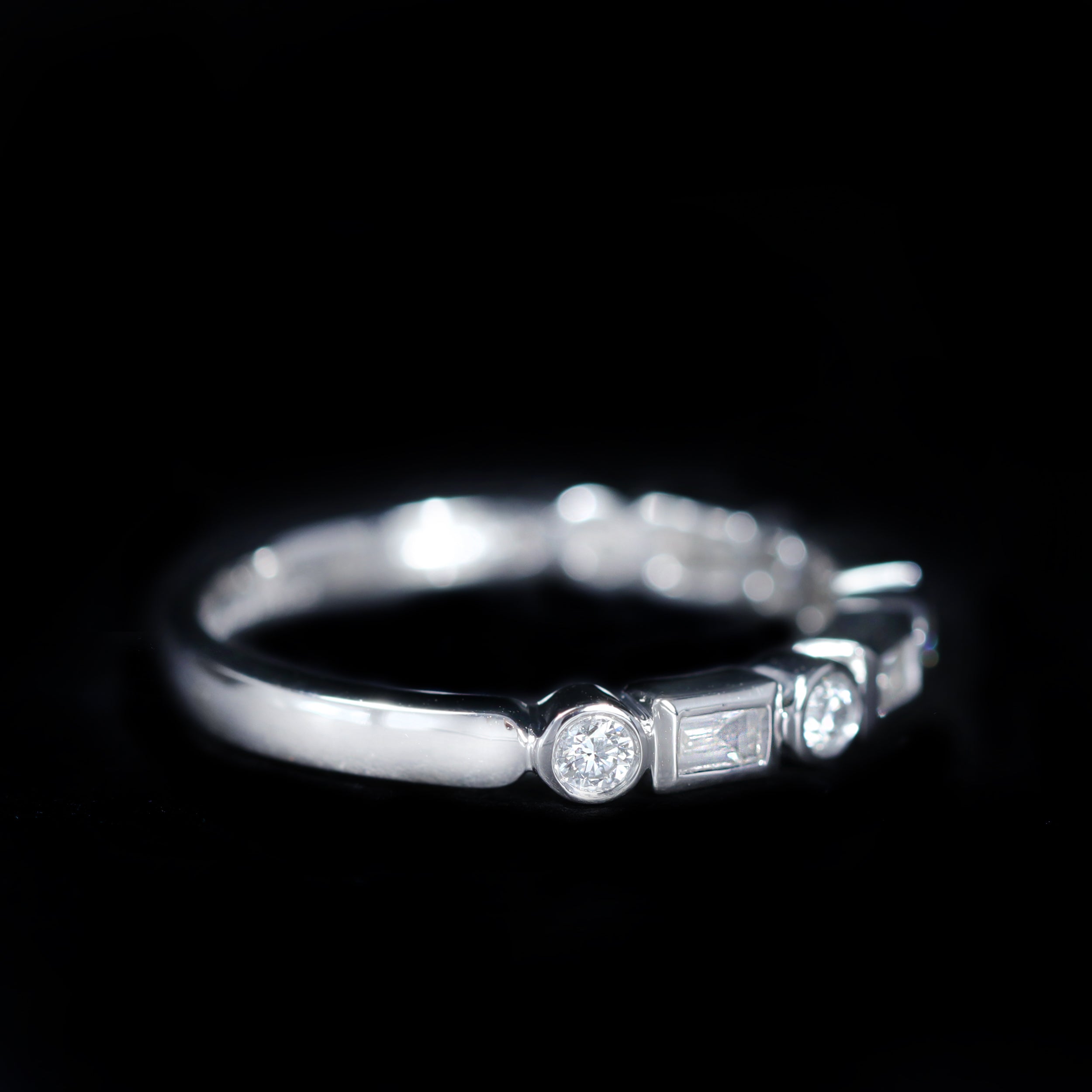 Platinum 0.62 CTW Baguette and Round Brilliant Cut Diamond Band