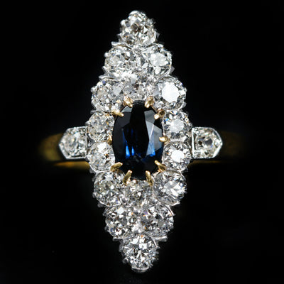 Edwardian Platinum Topped 18k Yellow Gold 0.68 Carat Sapphire and Diamond Navette Ring